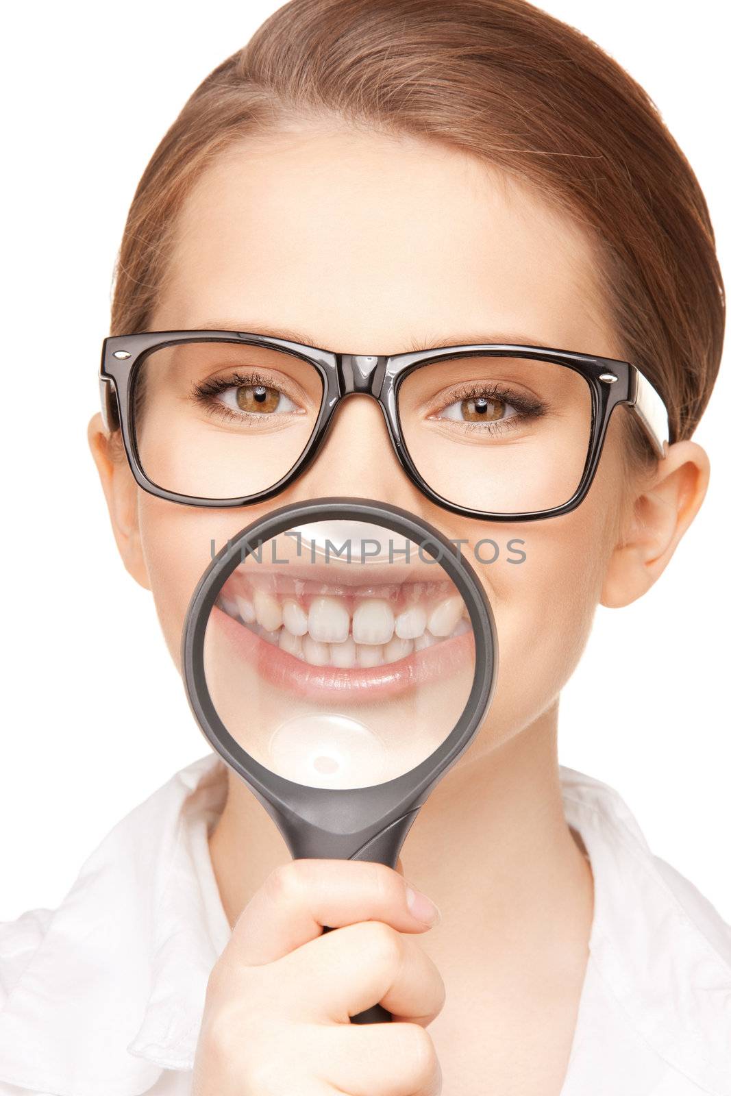 woman with magnifying glass showing teeth by dolgachov
