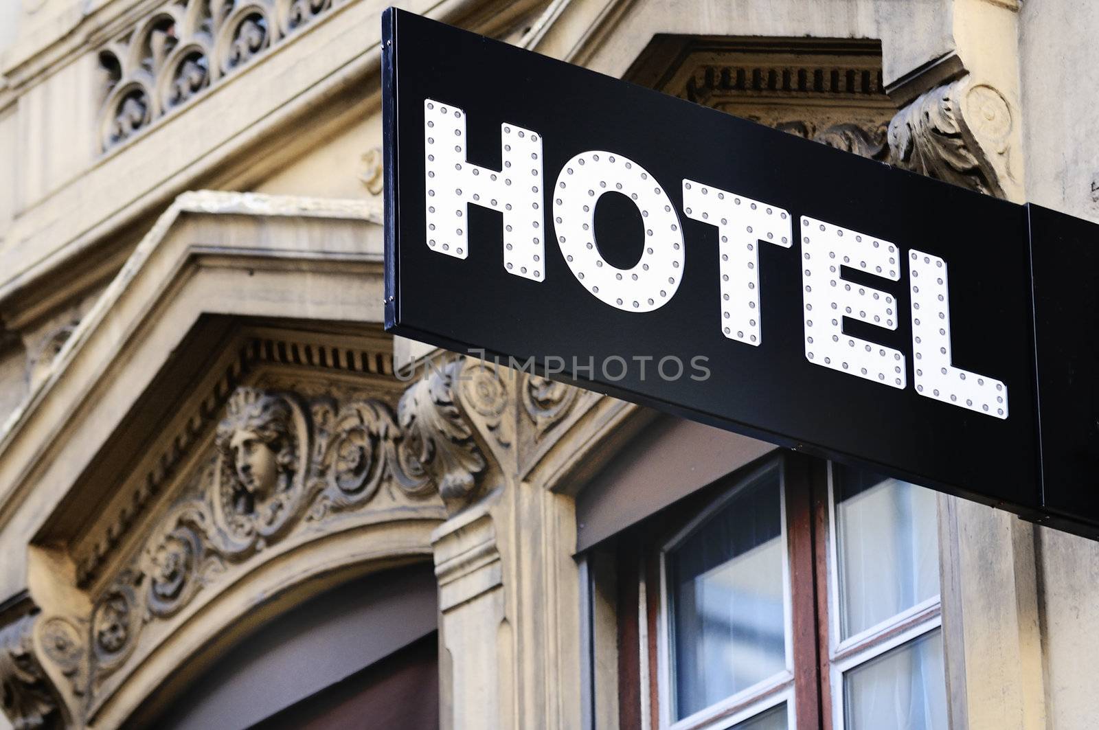 Illuminated urban hotel sign