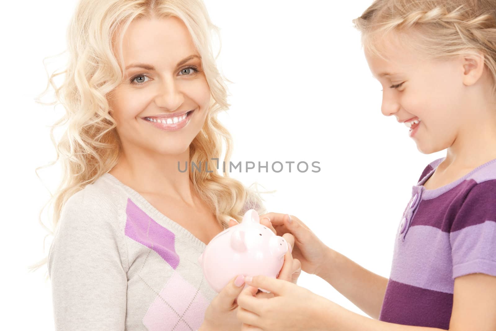 mother and little girl with piggy bank by dolgachov