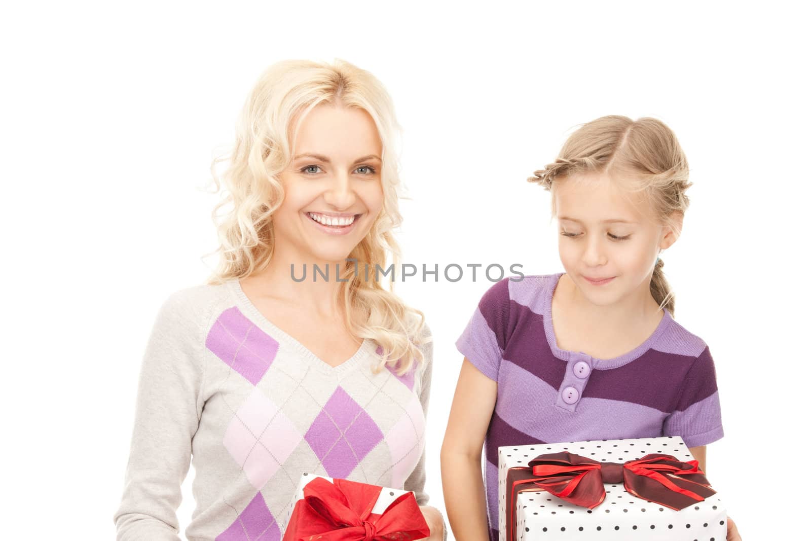 picture of mother and little girl with gifts.