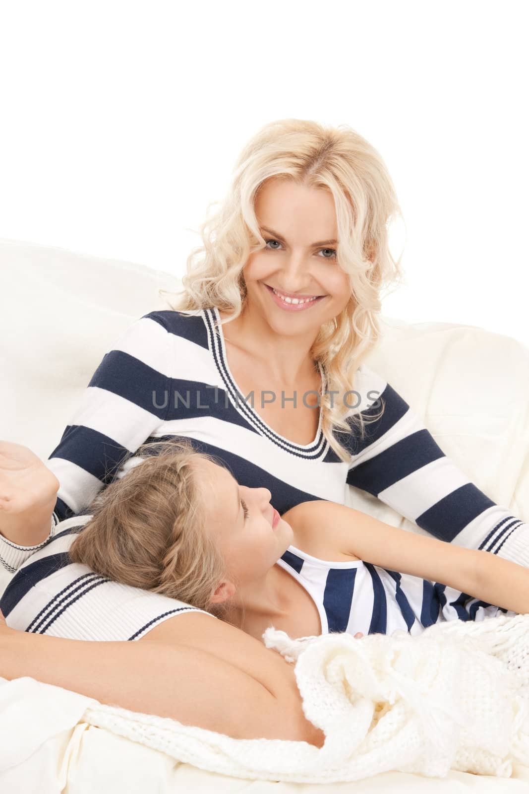bright picture of happy mother and little girl (focus on woman)