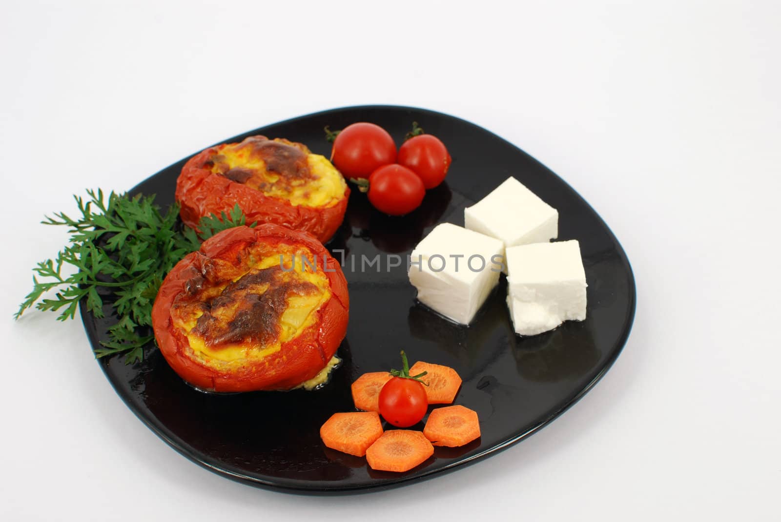Domestic cooked baked tomatoes with cheese