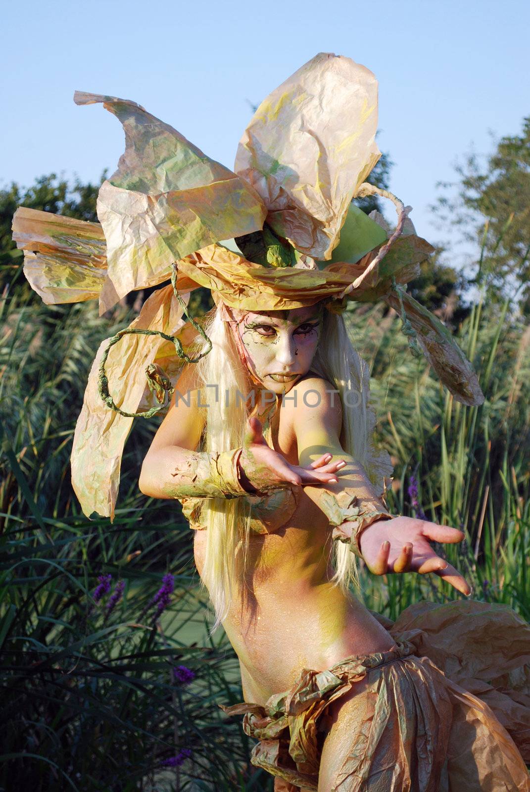 Girl face and body painting fairy forest willow dance