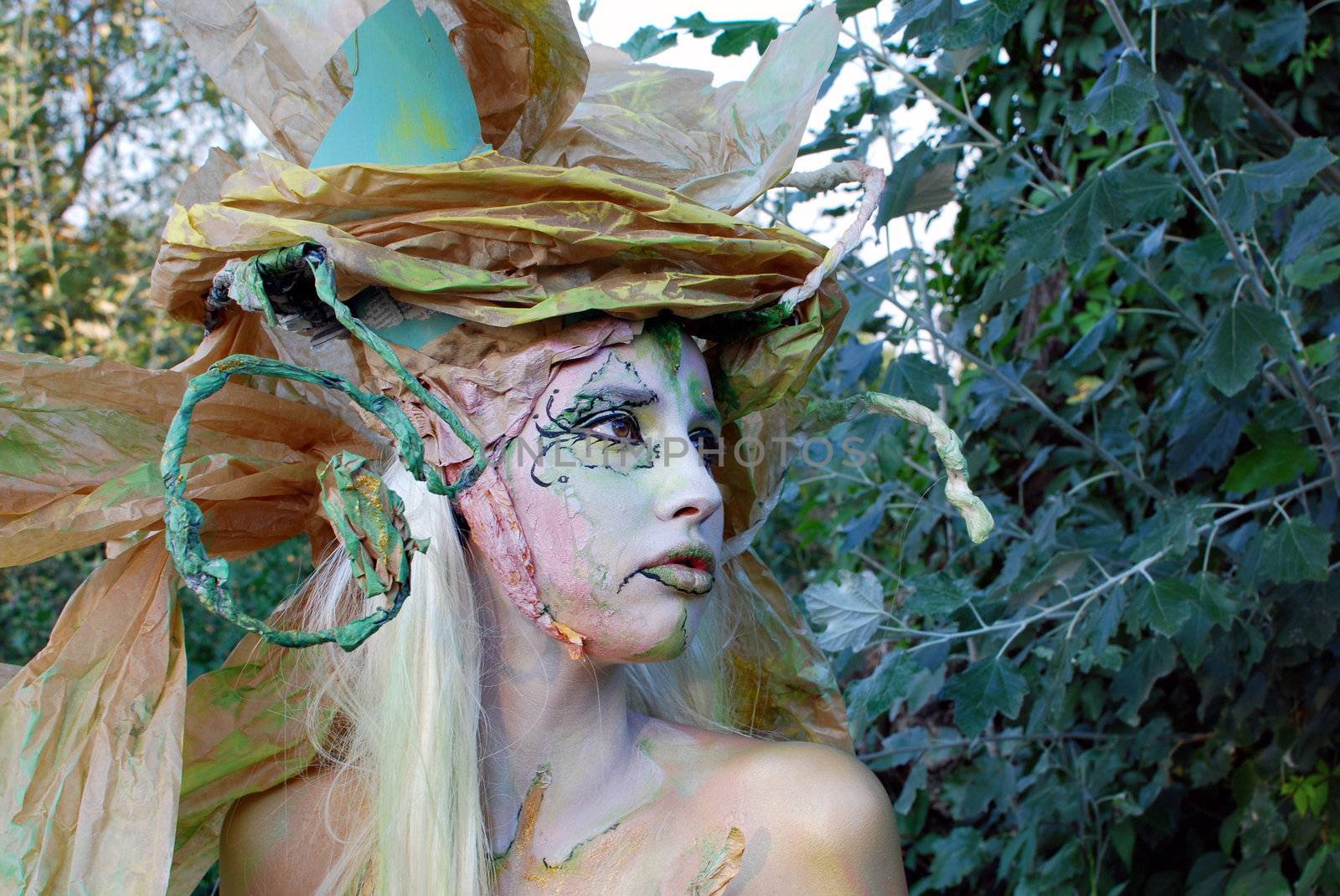 Girl face and body painting fairy forest willow portrait