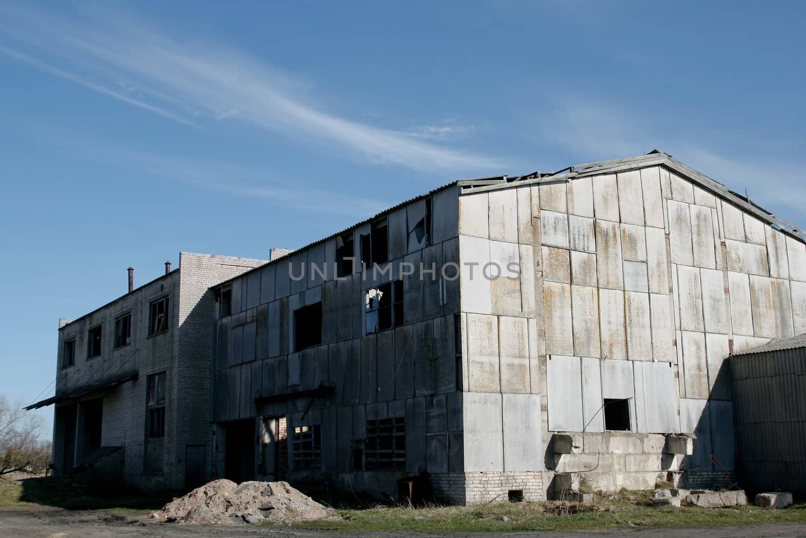 abandoned factory with broken windows and doors