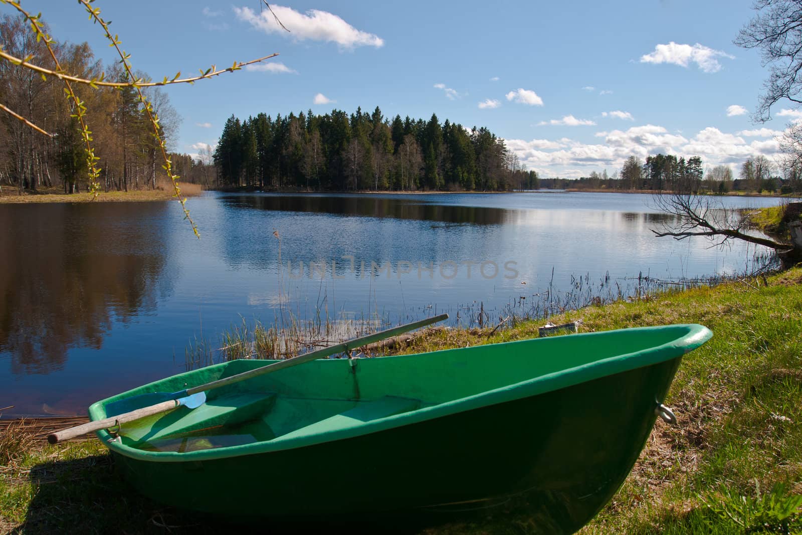 Idyllic rowing boat on a lake in the latvia