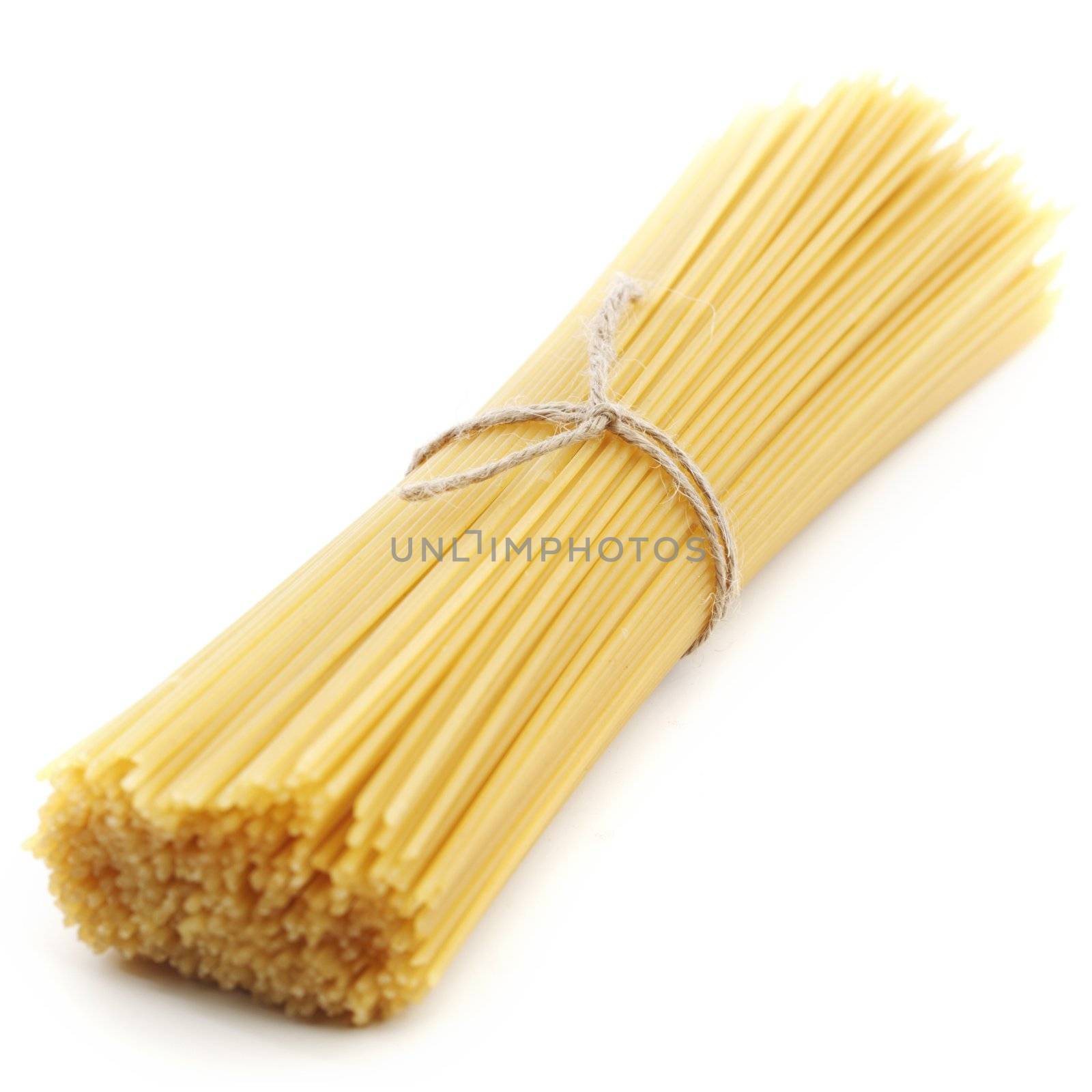 Dry spaghetti isolated on white background