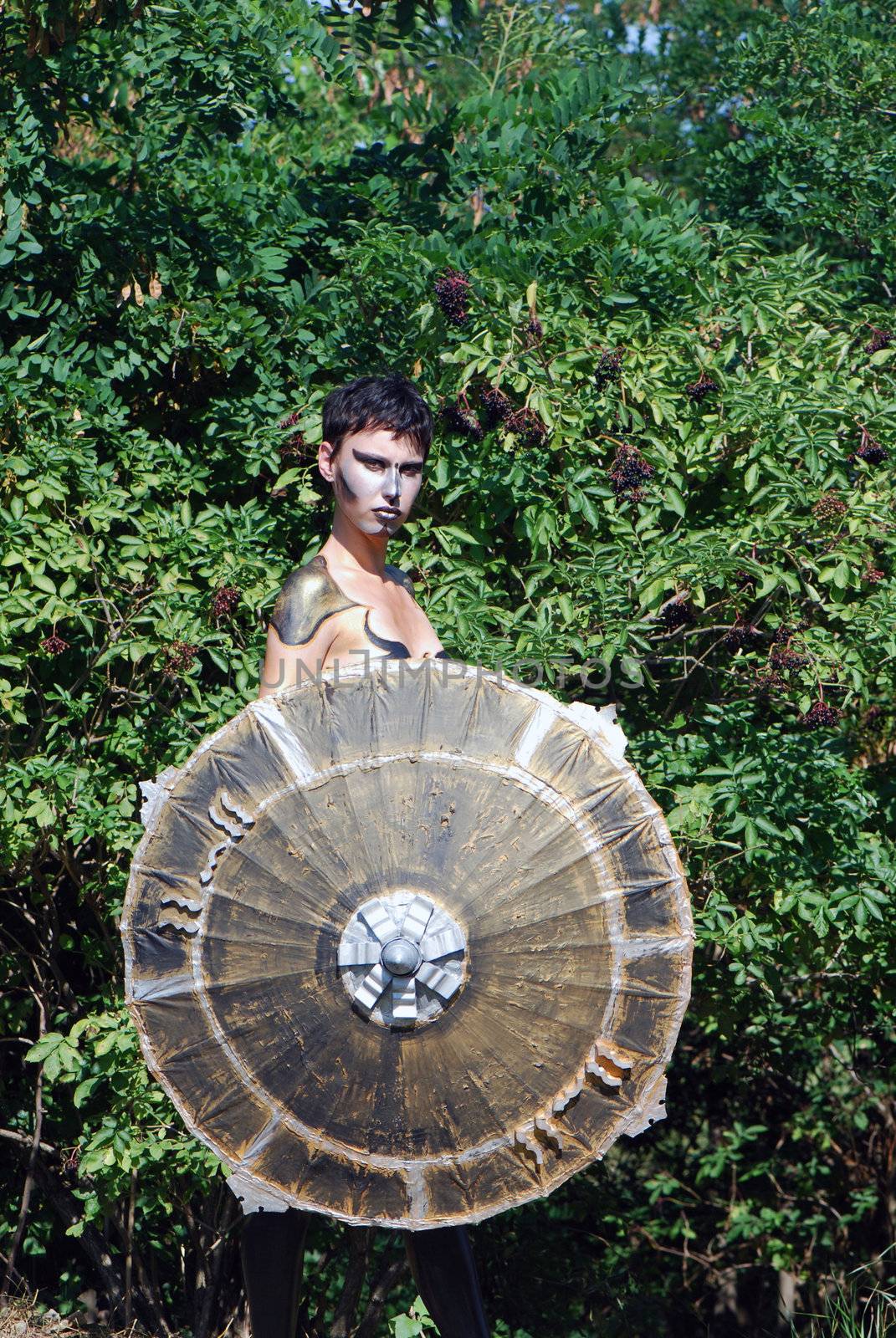 Girl with sunshade face and body paint