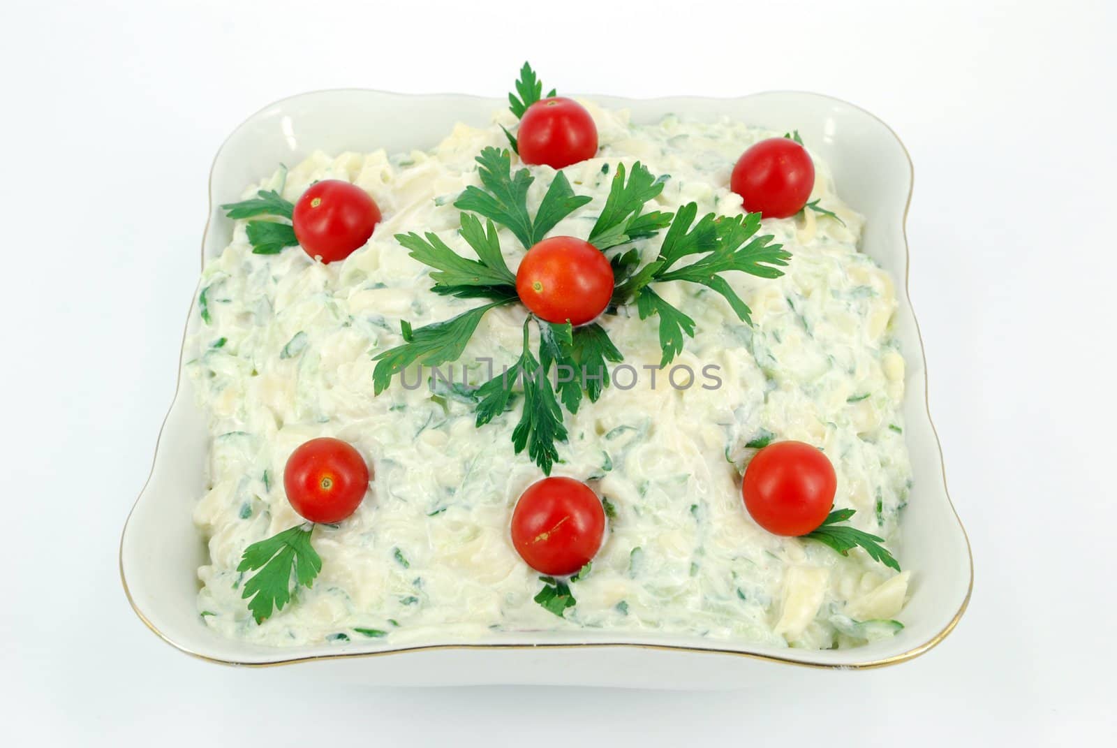 Salad with macaroni cucumber and tomatoes