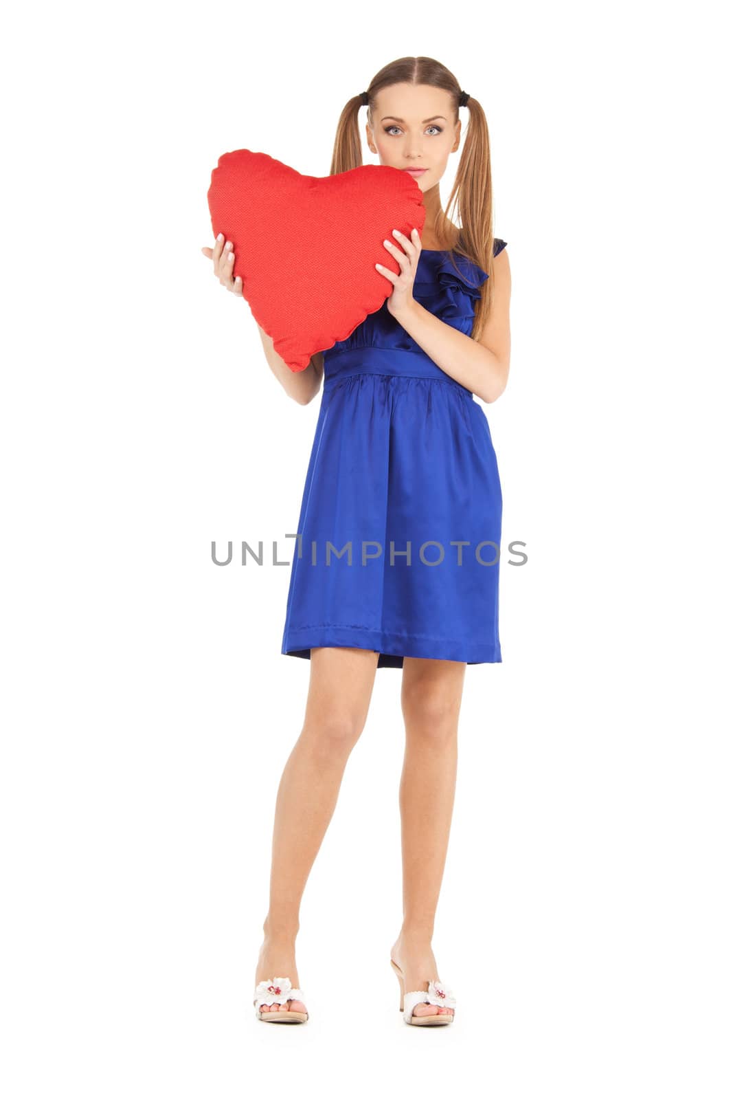 picture of lovely woman with red heart-shaped pillow