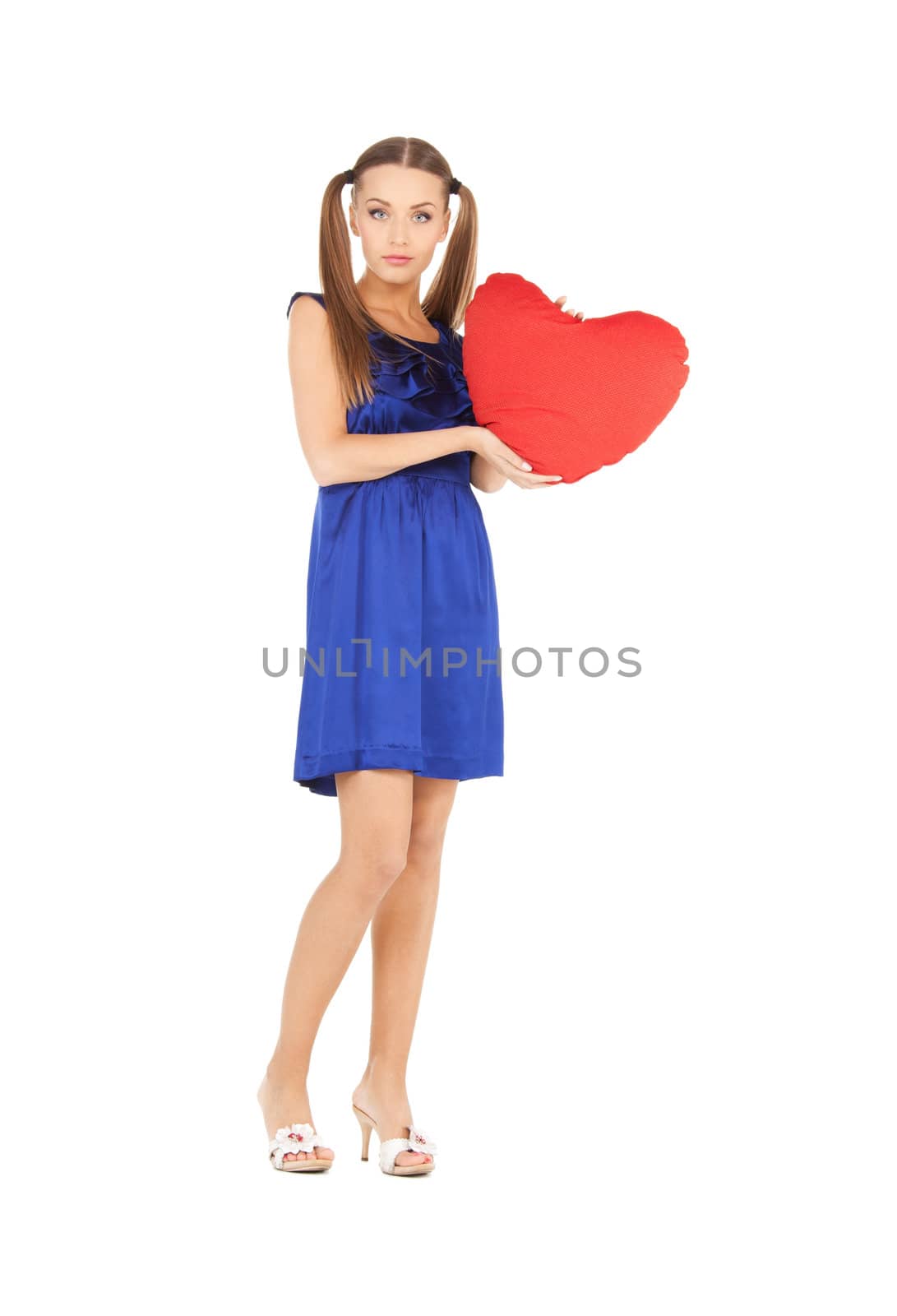 picture of lovely woman with red heart-shaped pillow