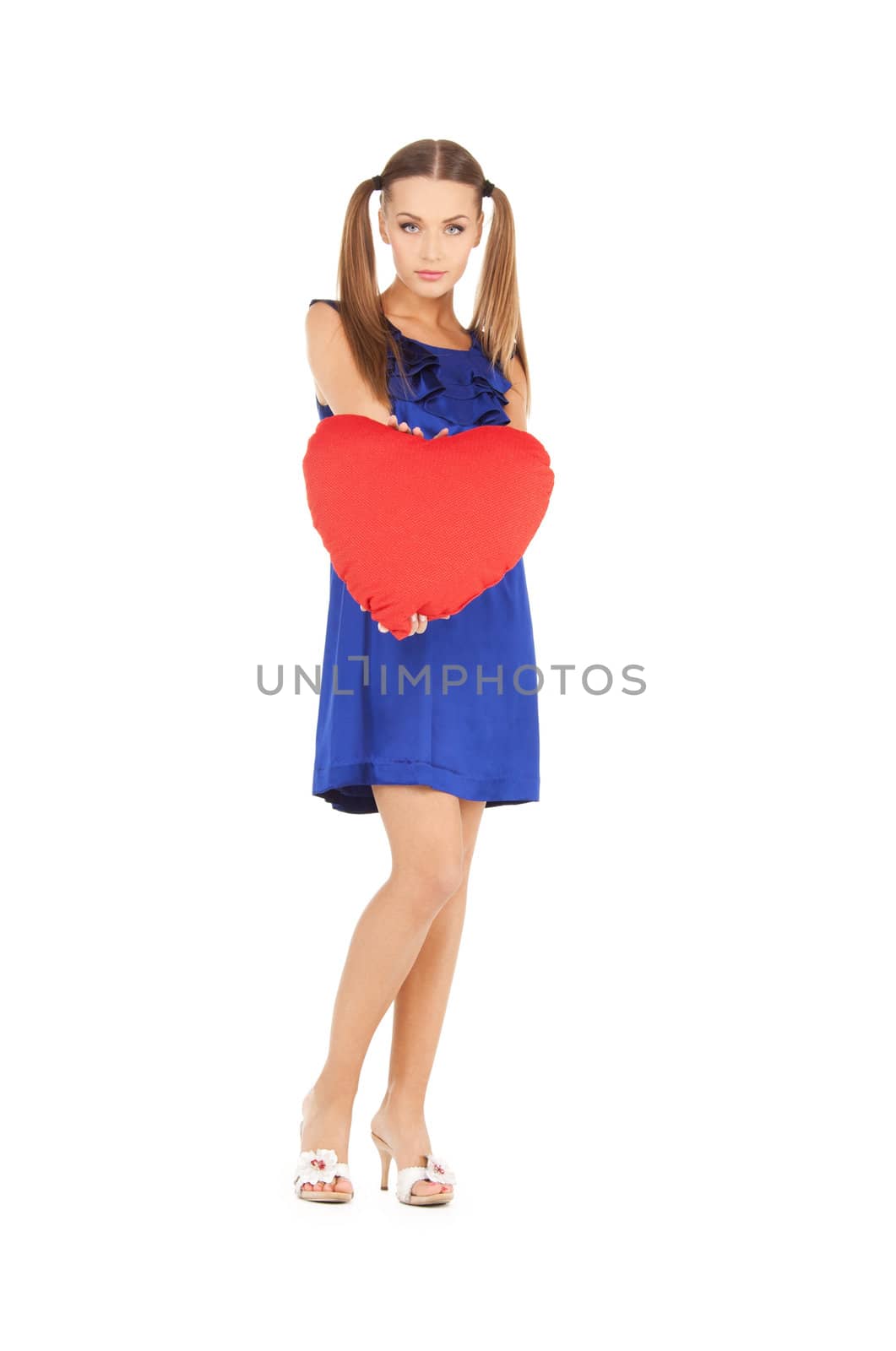 picture of lovely woman with red heart-shaped pillow