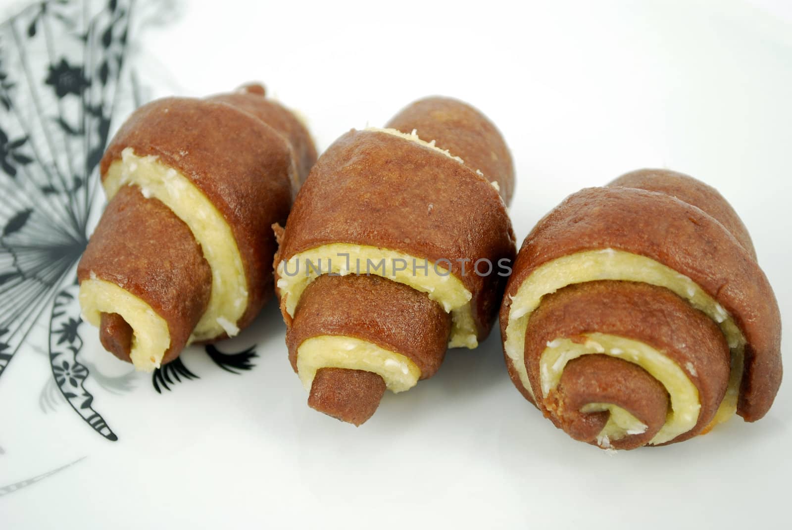 Sweet coconut roll cookie on dish