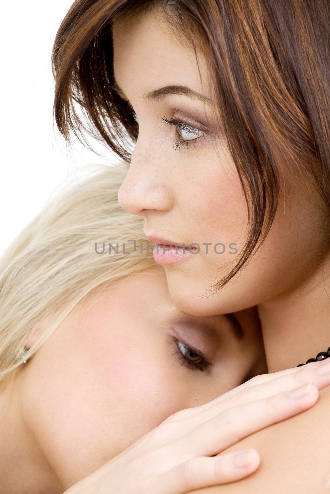 intimate picture of two lovely girls cuddling