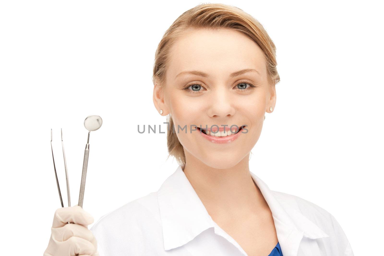 picture of attractive female dentist with tools