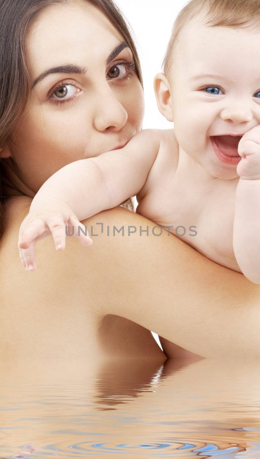 baby boy and beautiful mama in water by dolgachov