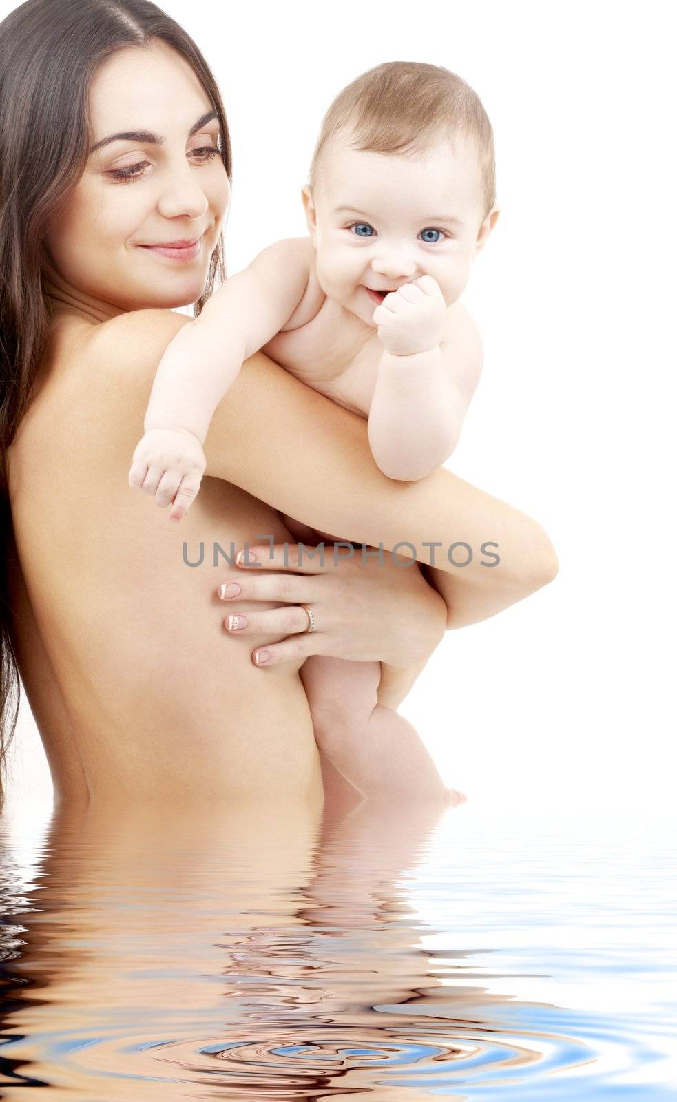 clean baby in mother hands by dolgachov