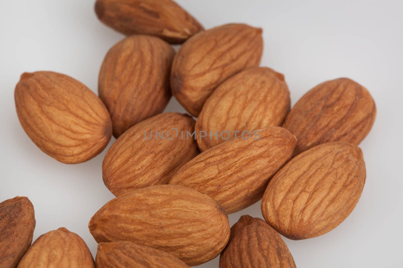 Almonds closeup on a white background macro