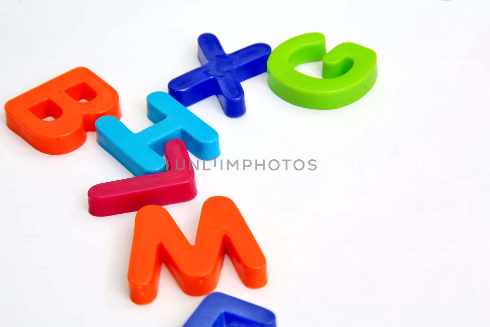 Alphabet letters on plain background