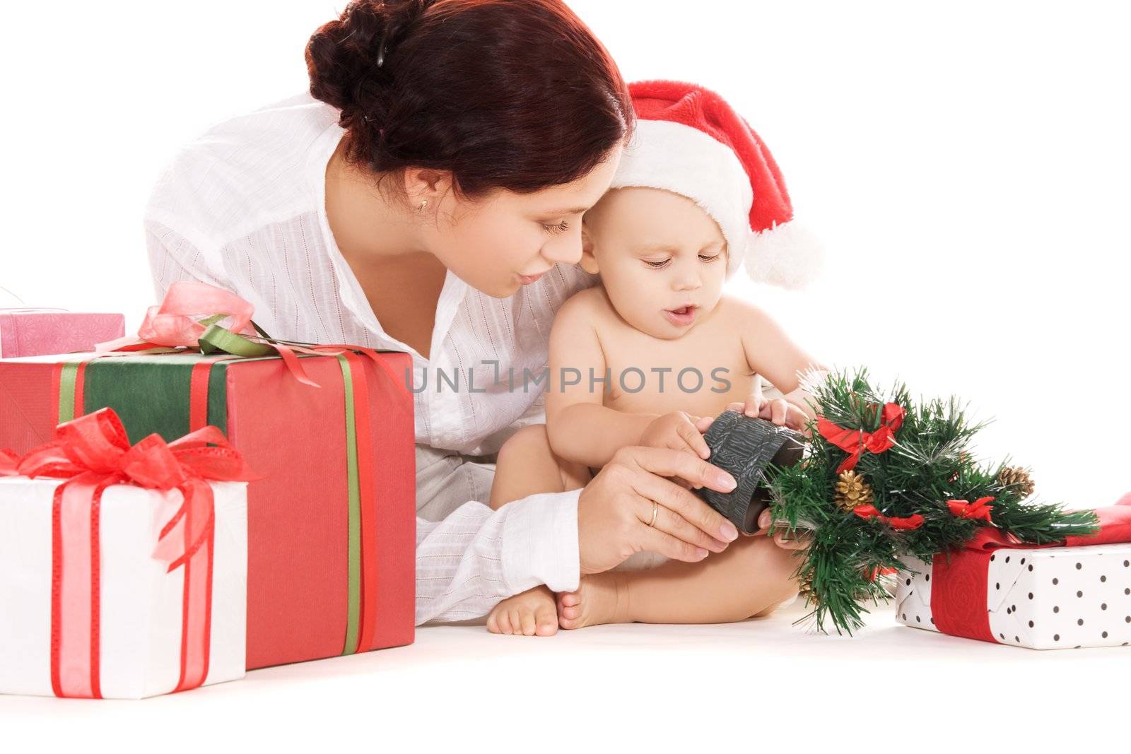 baby and mother with christmas gifts by dolgachov