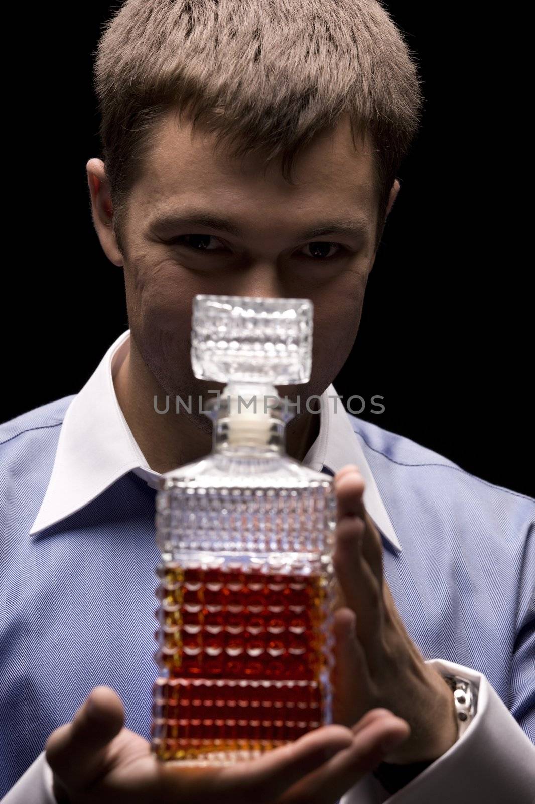 dark picture of man with a bottle