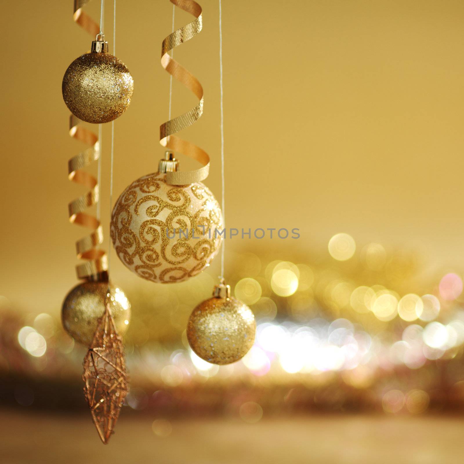 golden christmas balls on bokeh background