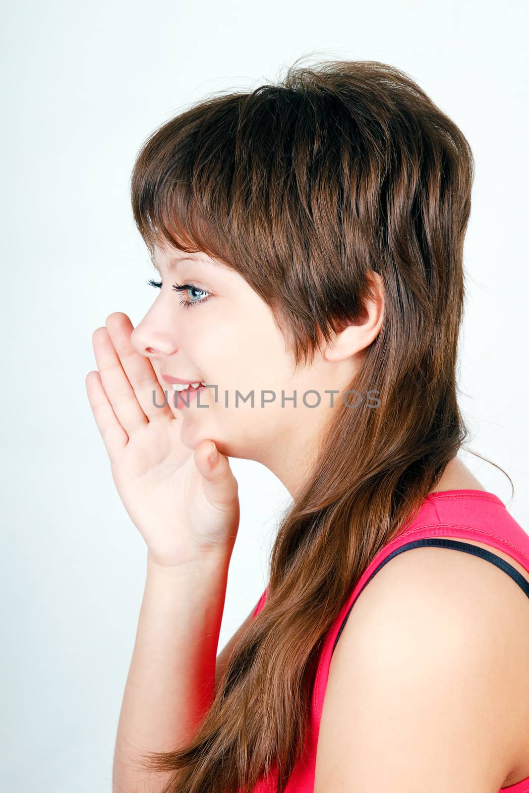 blue-eyed girl says something in secret behind his hand