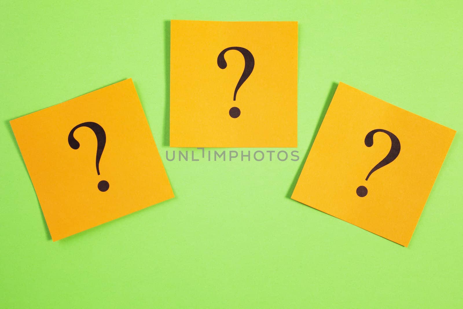 Three Question Marks Orange on Green Background by Travelling-light