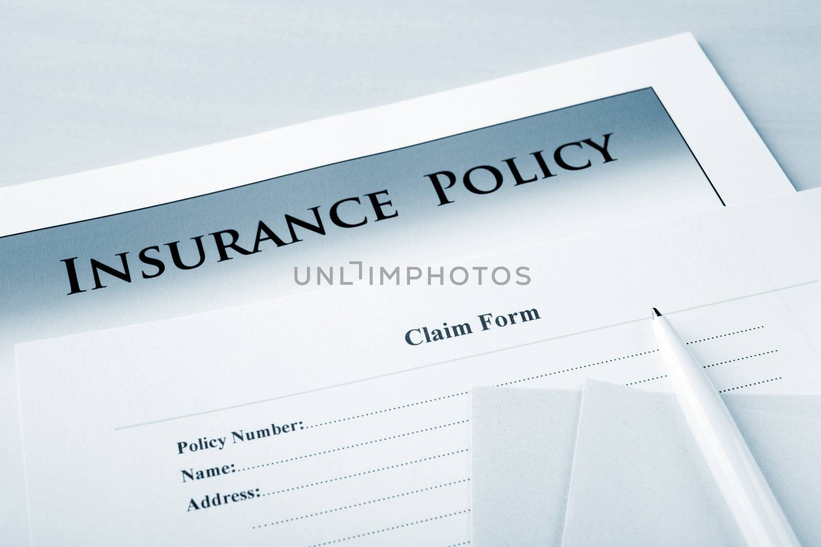Insurance policy and claim form, focus on words "claim form".