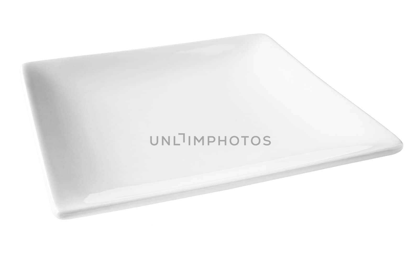 Square white porcelain plate, set at an angle, isloated on white and with clipping path included.