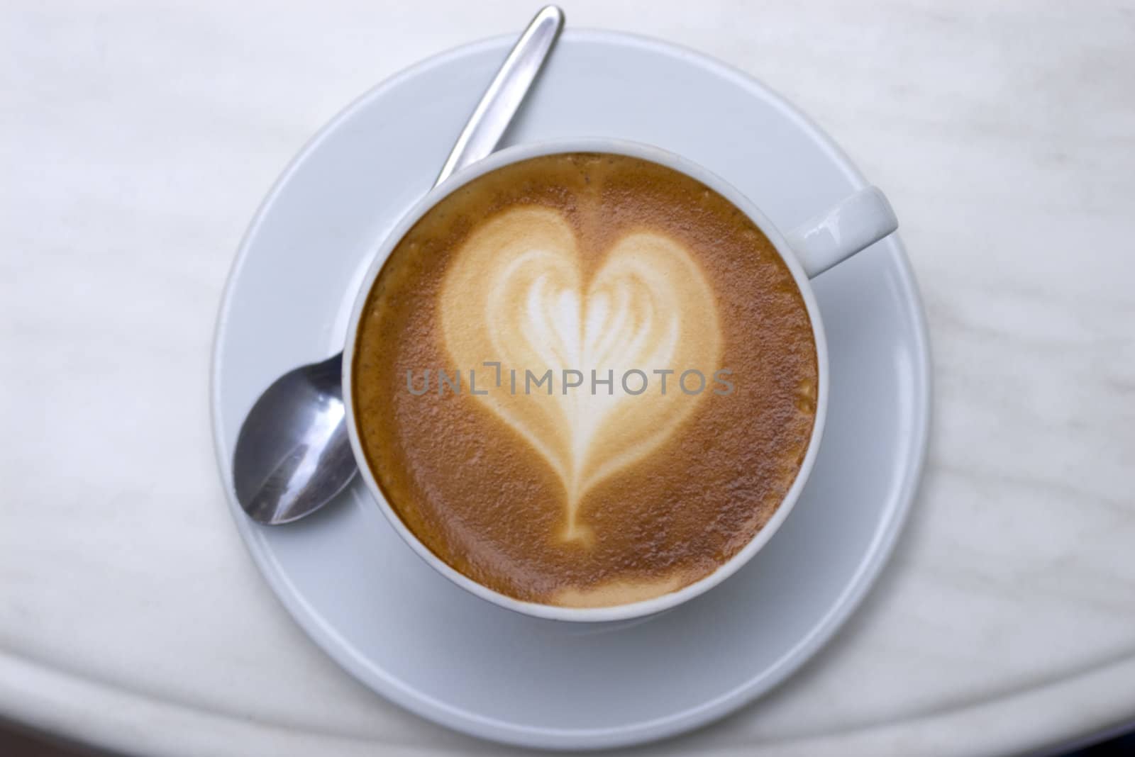 Cappuccino with heart design in foam