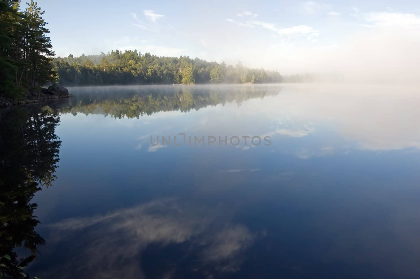Fog on the lake in early morning