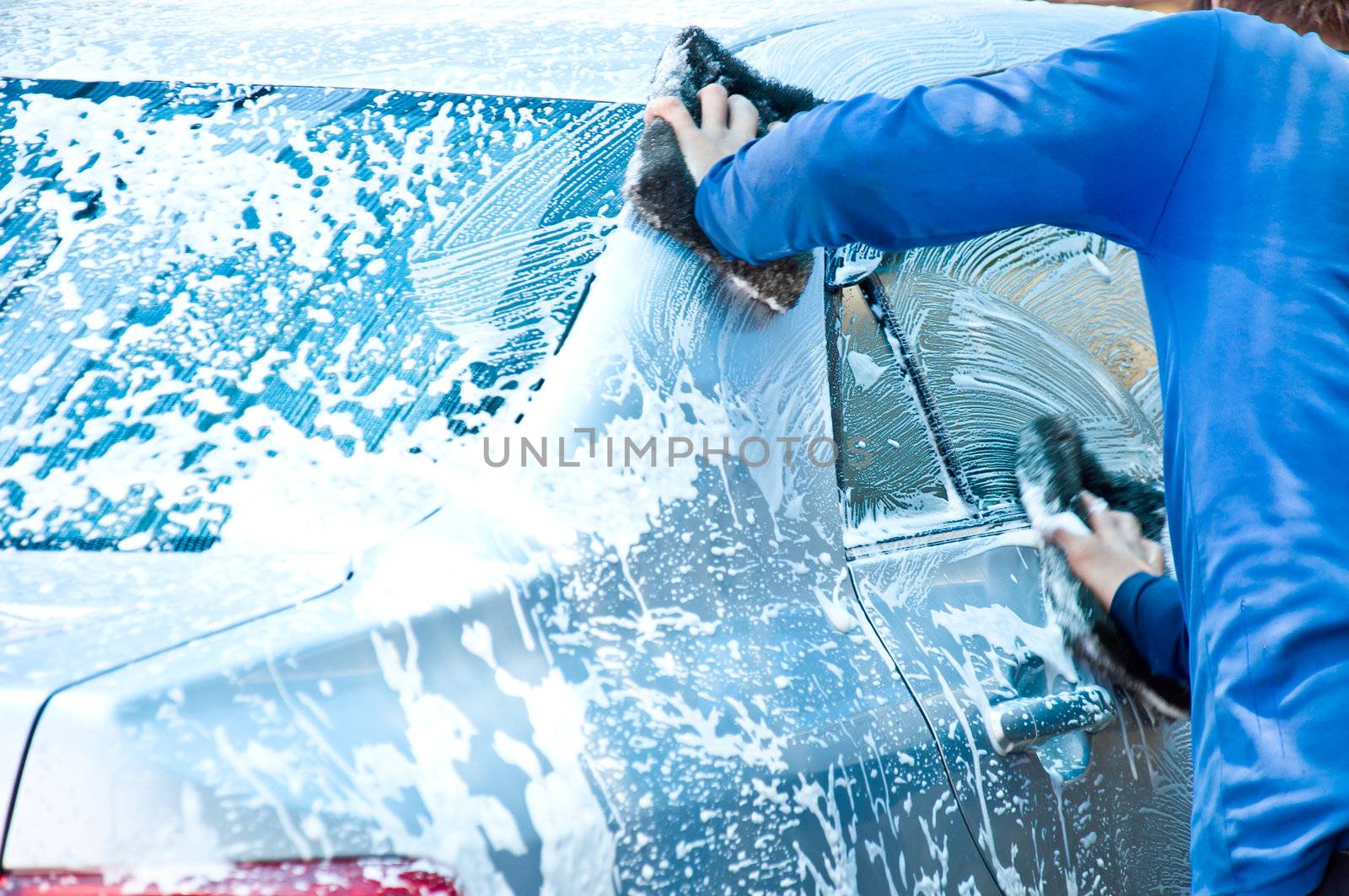 cleaning car by clean car care service