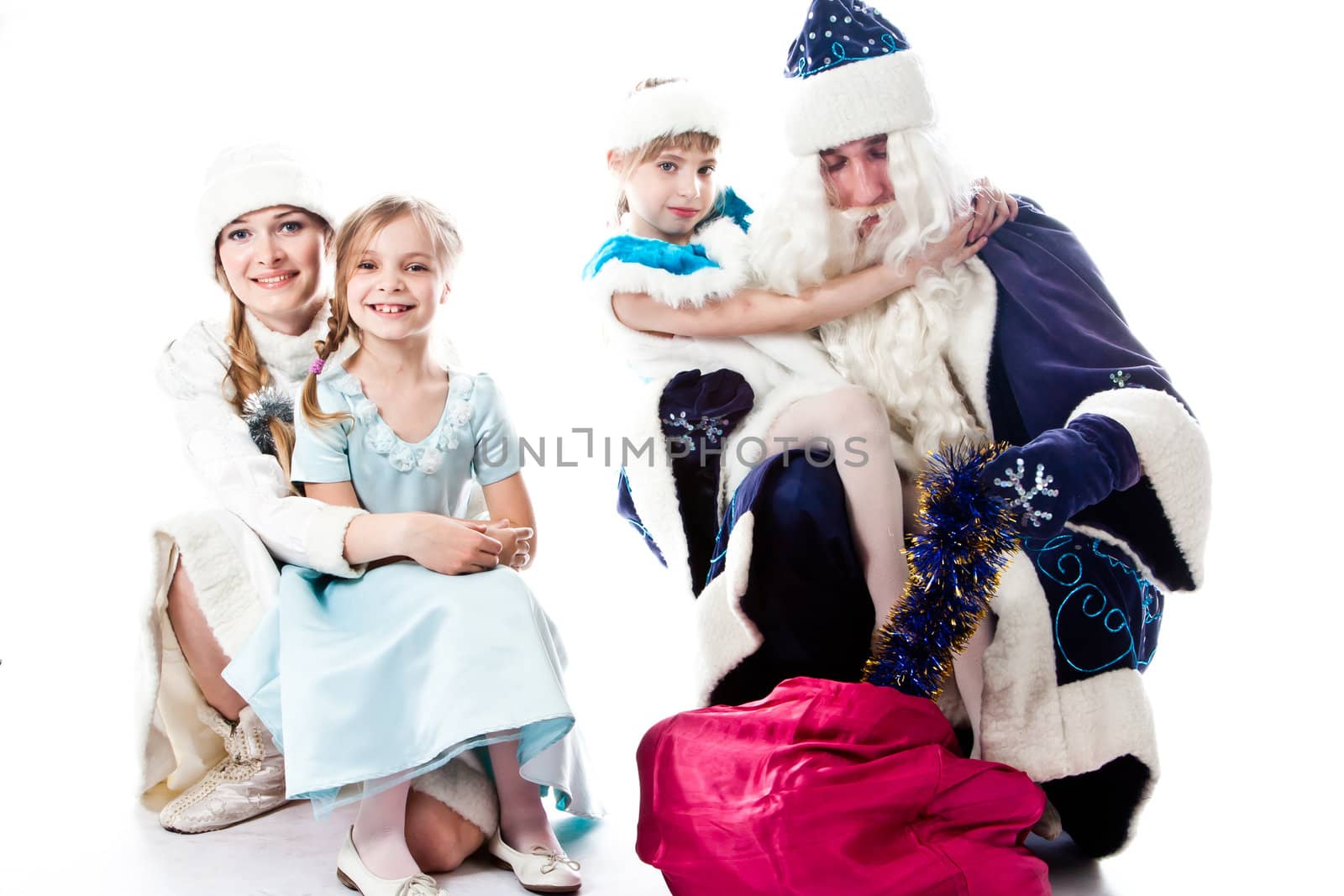 Santa Claus, a granddaughter and a beautiful little girl