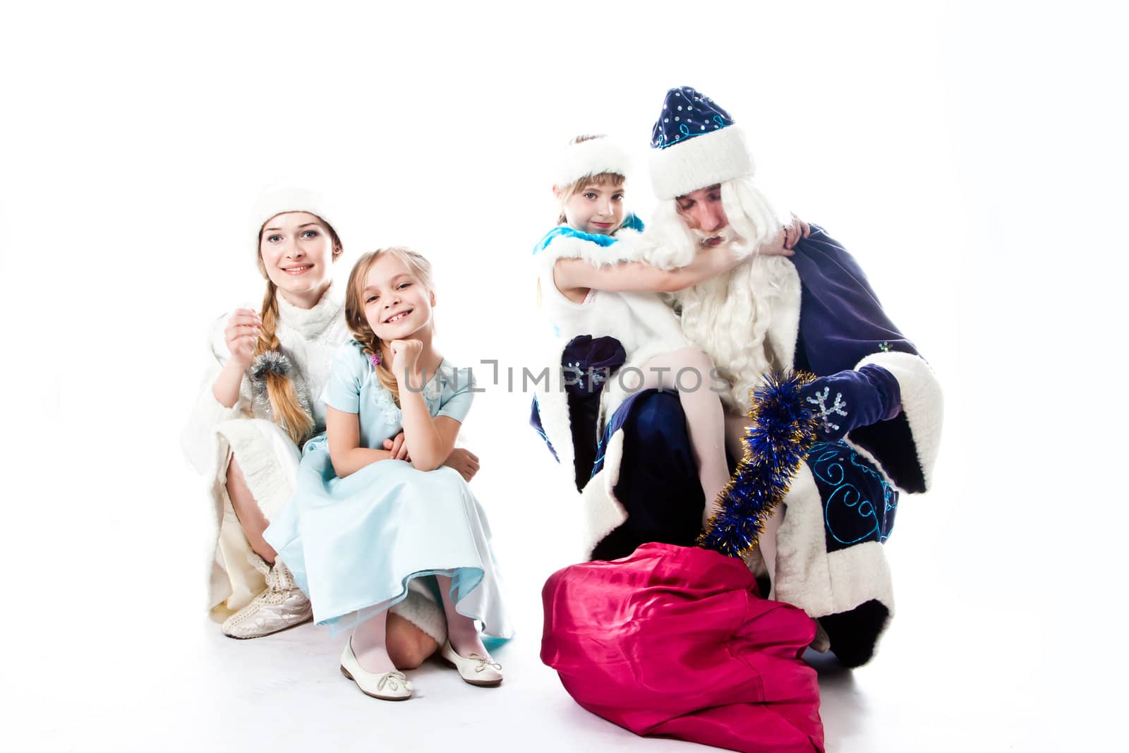 Santa Claus, a granddaughter and a beautiful little girl