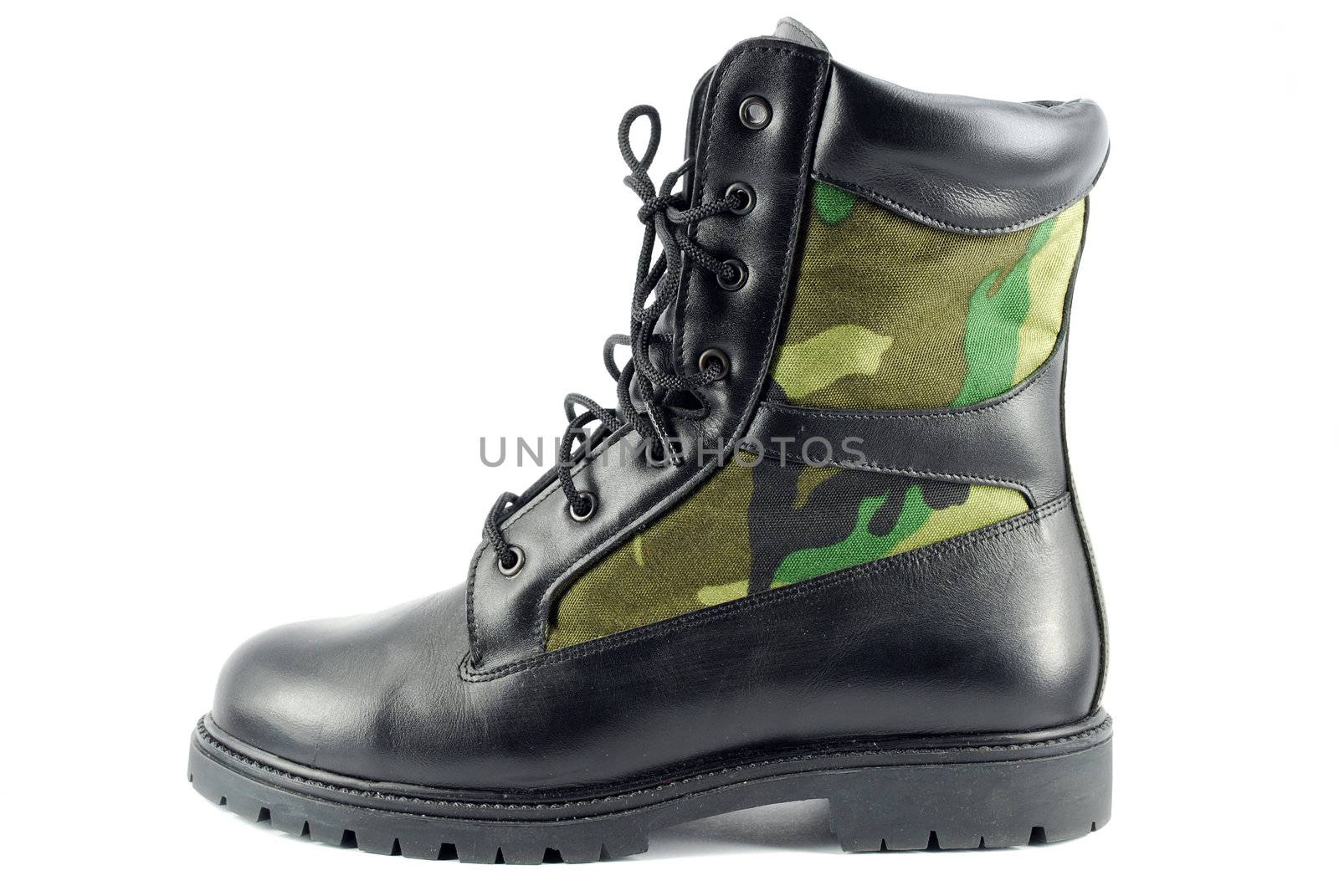 Military combat boot on white background