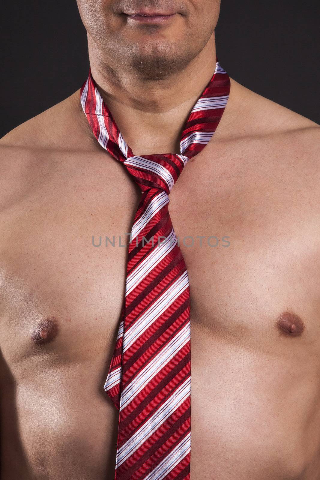 An image of a naked business man with a tie