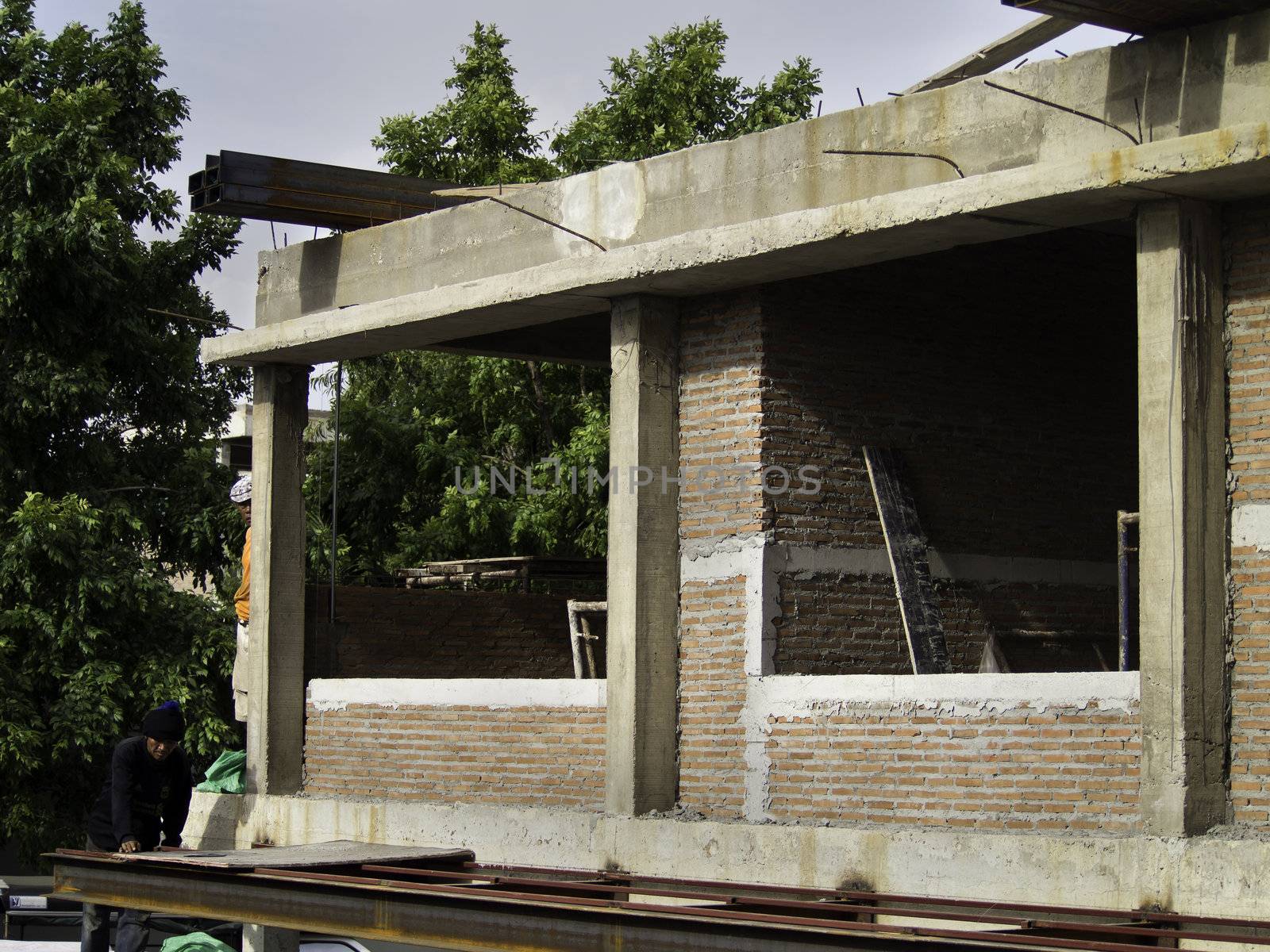 Unfinished house of brick, still under construction 