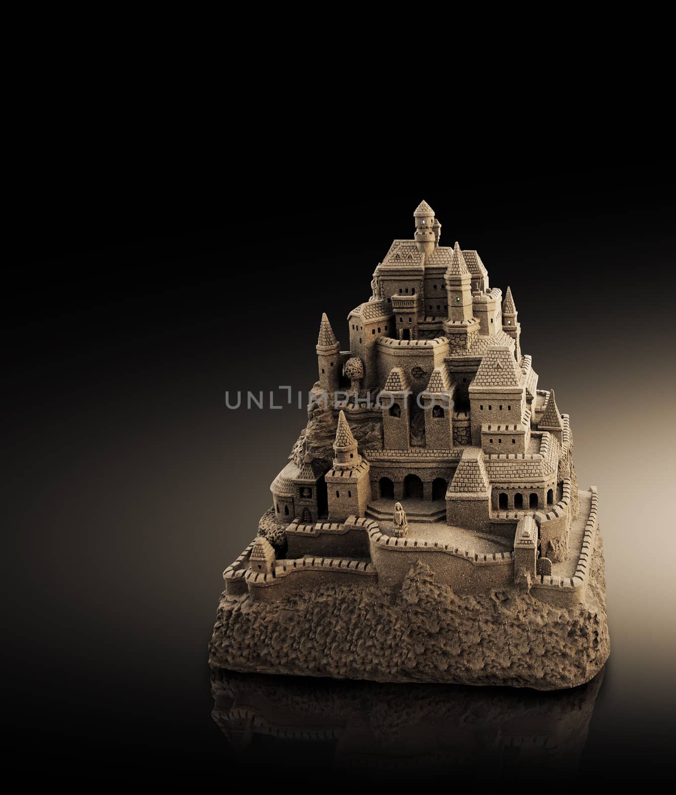 large sandcastle with many towers and crenels in retro look