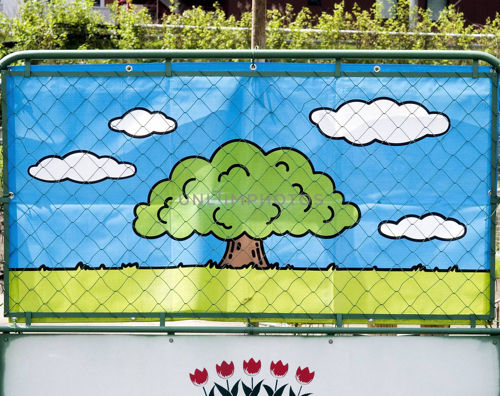decorative colorful cartoon image on building site fence in tokyo japan