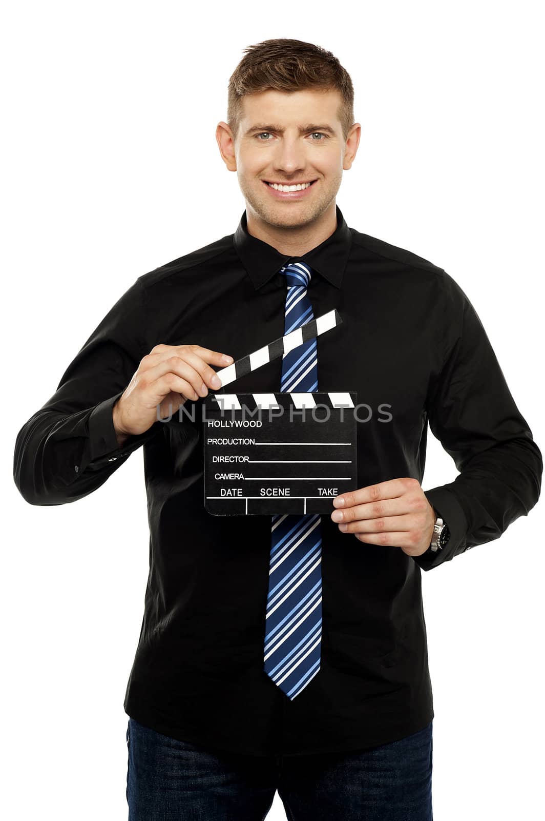 Young guy holding clapboard. Its showtime