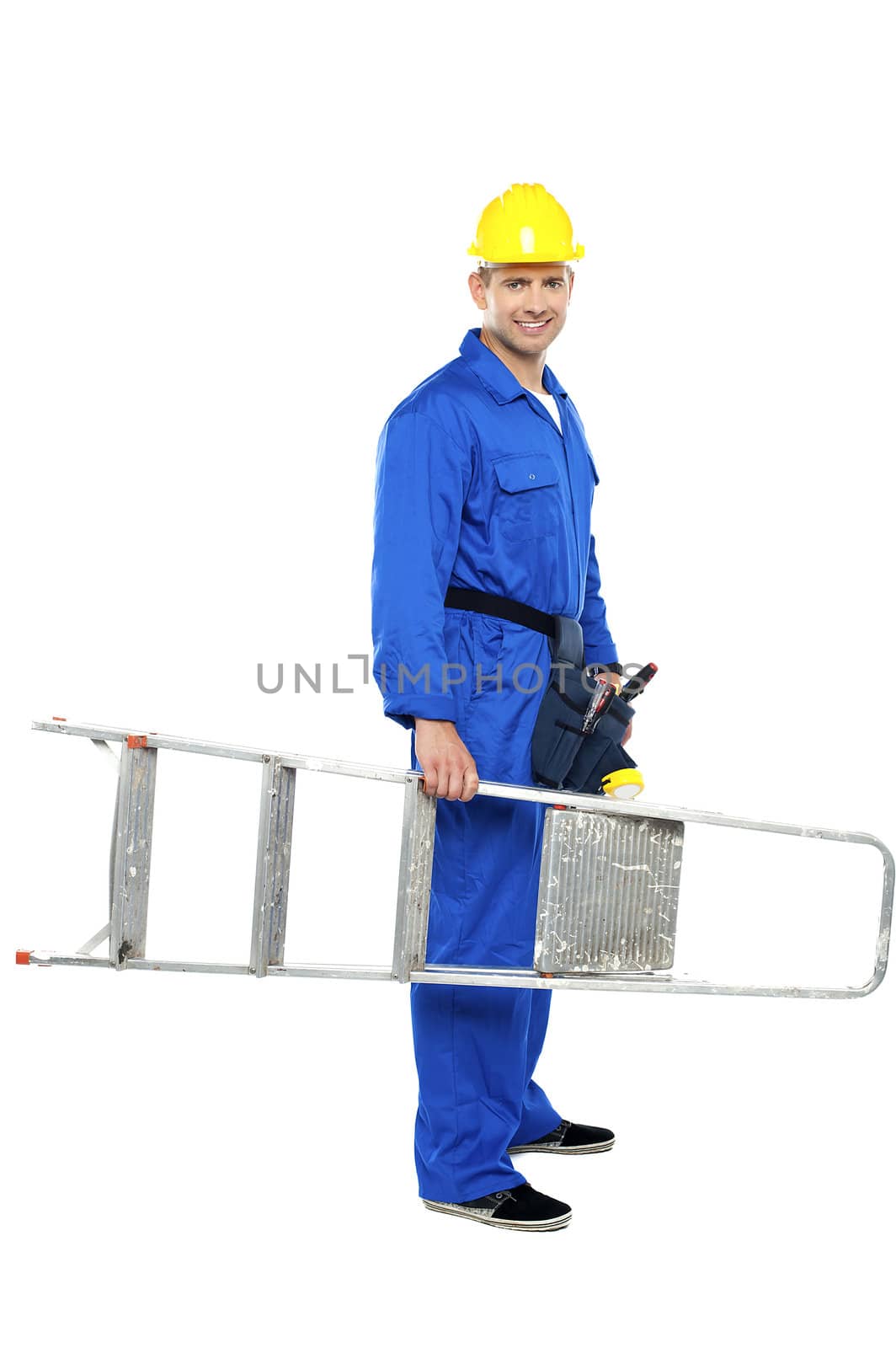 Young repairman ready with stepladder isolated against white background
