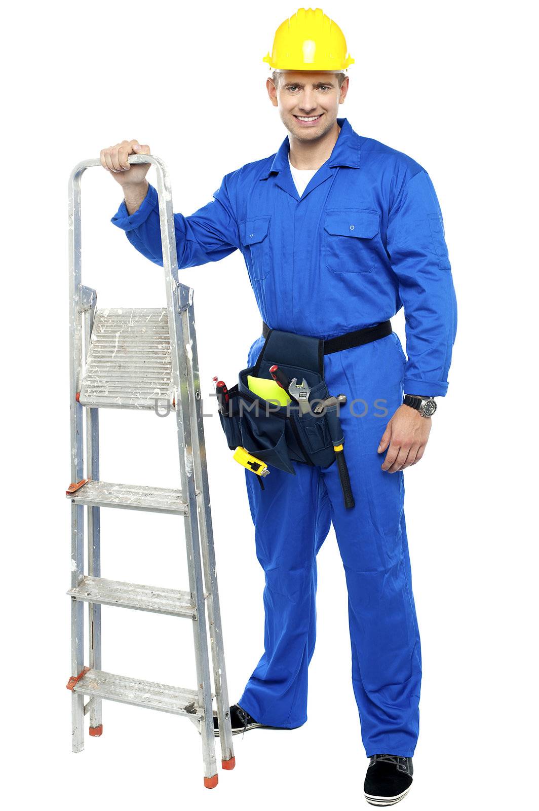 Young construction worker ready to get to work with stepladder isolated over white