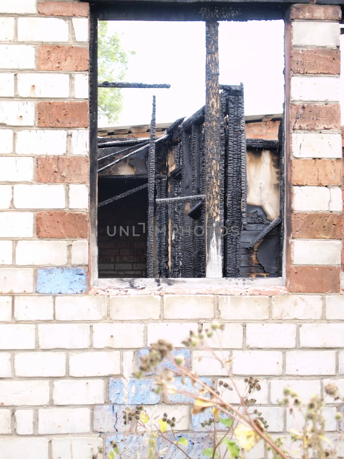 window in a burned-out house