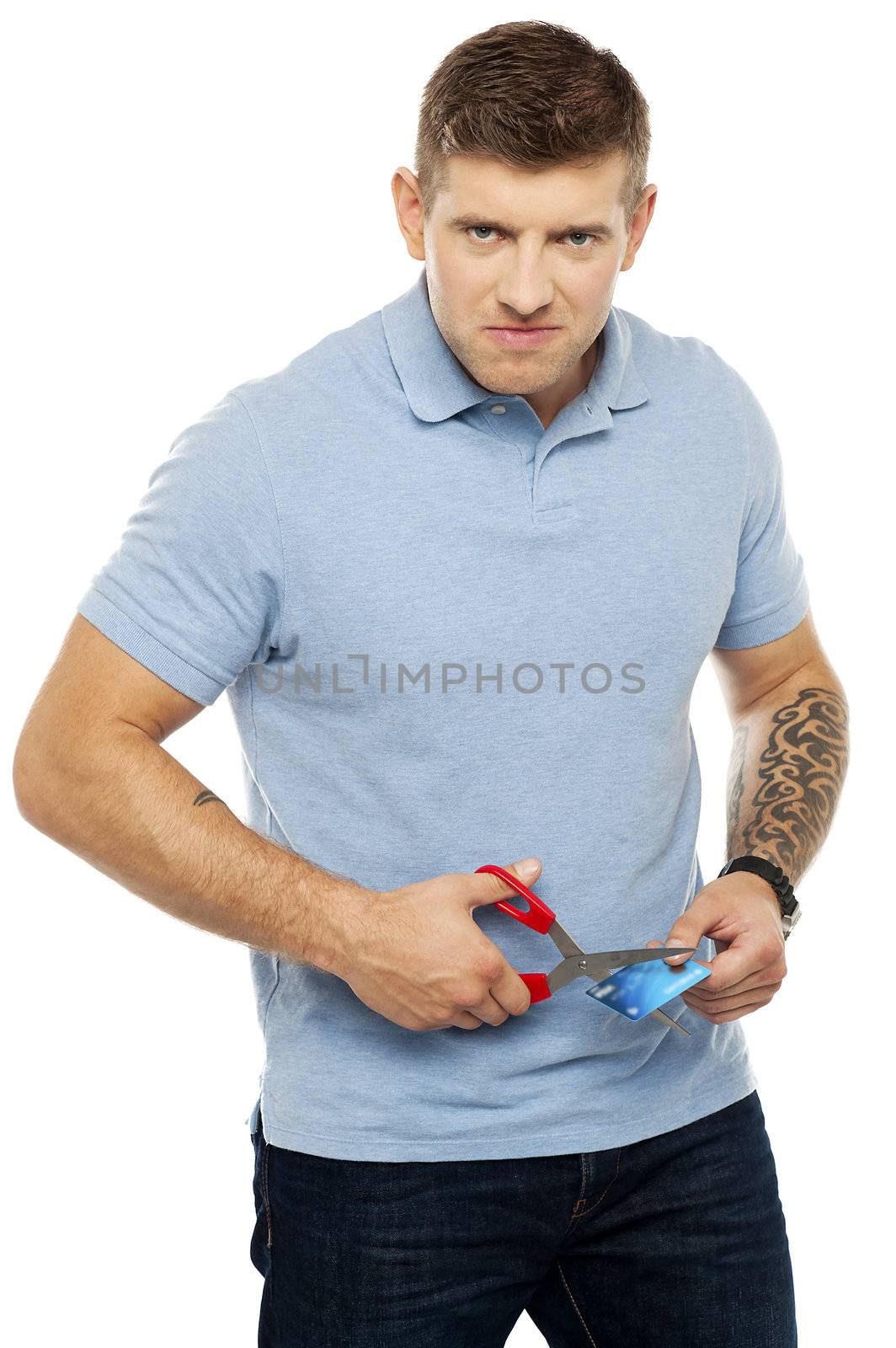 Frustrated customer cutting his credit card with scissors