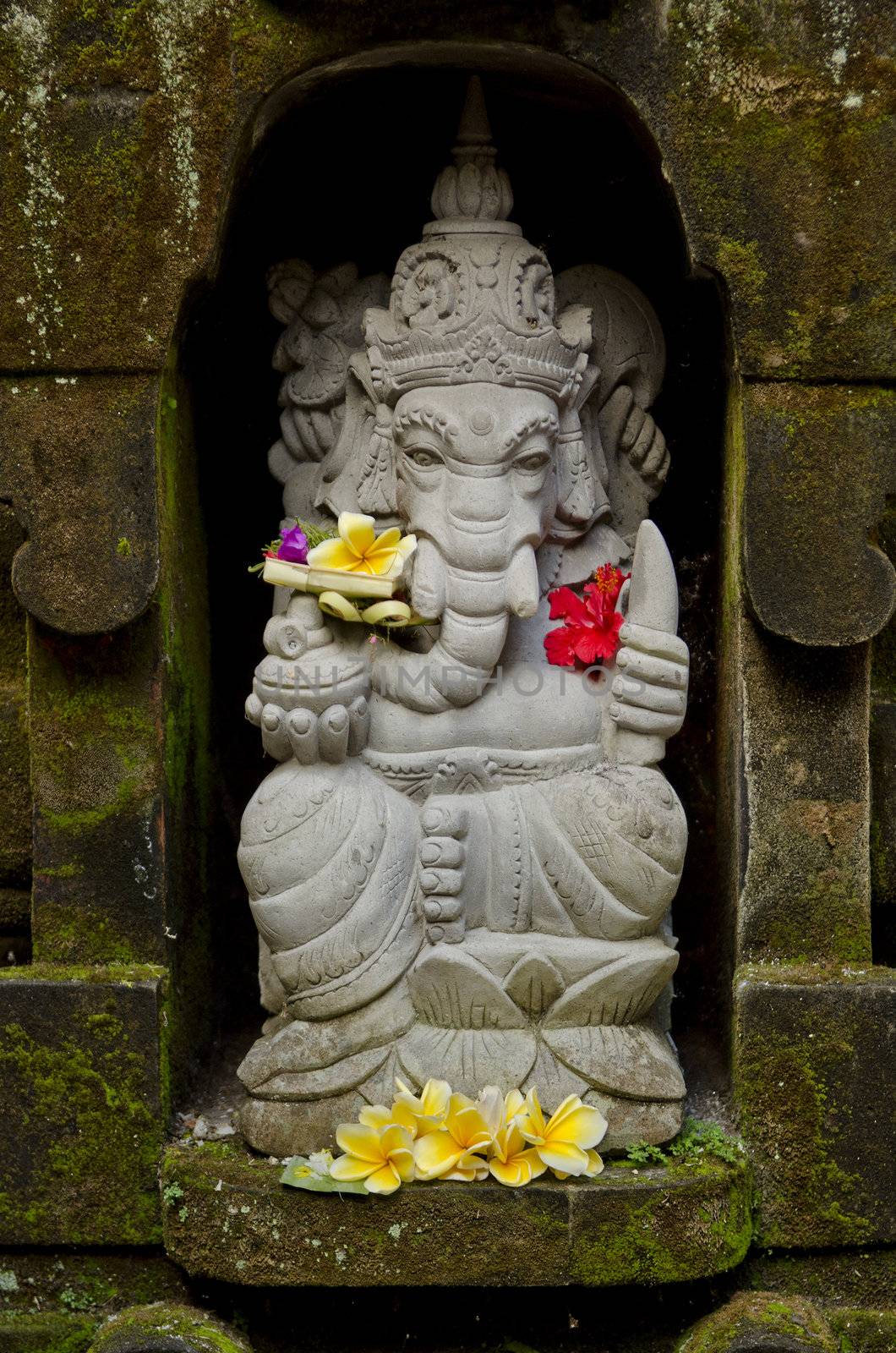 ganesh statue in bali indonesia by jackmalipan