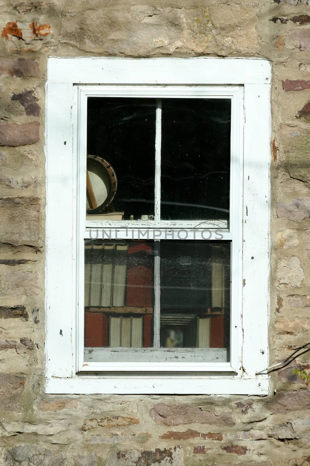 Old window with books image