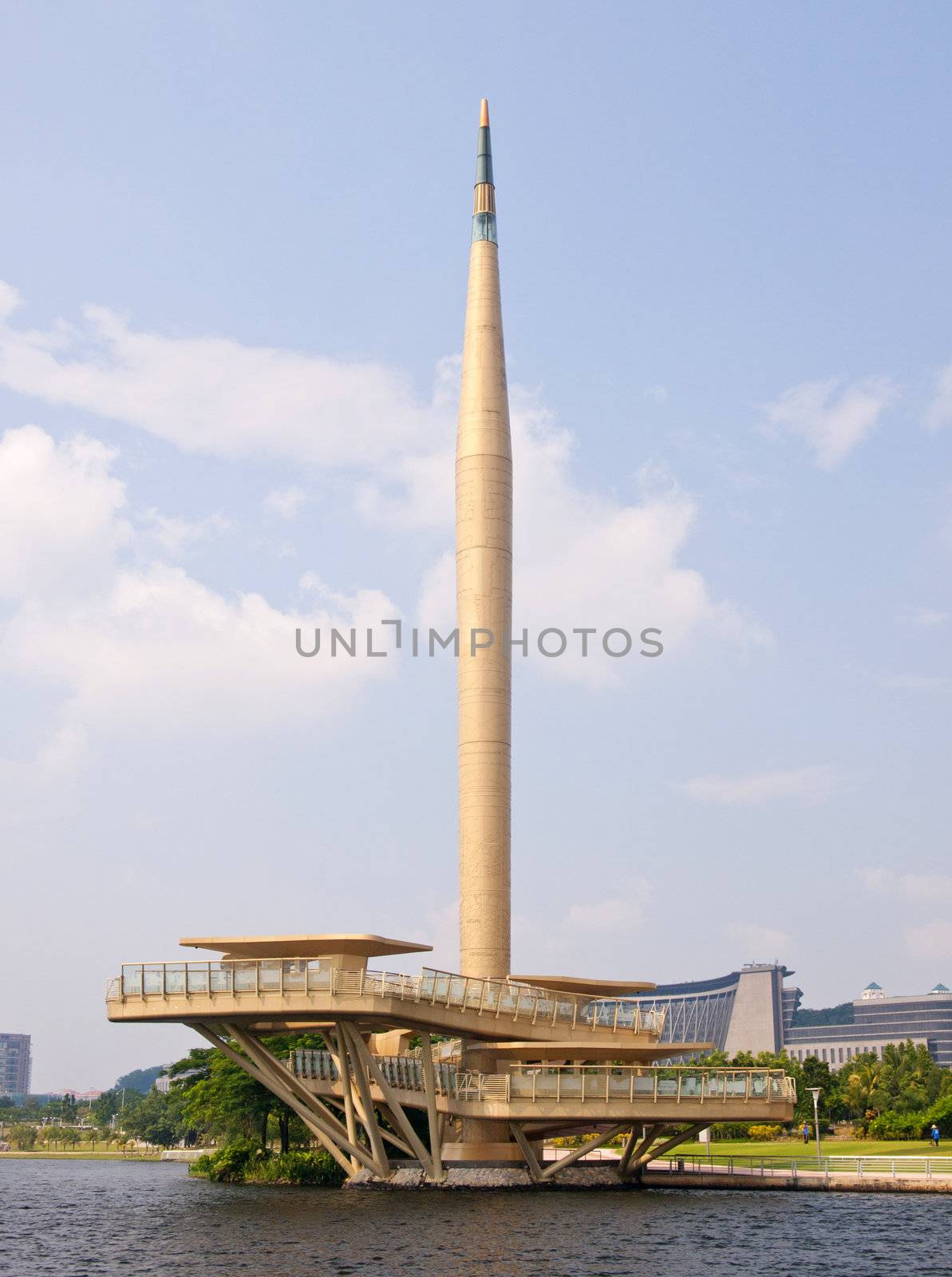 PUTRAJAYA, MALAYSIA - MAY 24: Millennium Monument or Monumen Alaf Baru is a national monument in Putrajaya, Malaysia on May 24, 2008. This monument is 68m tall and constructed of solid metal structures. 