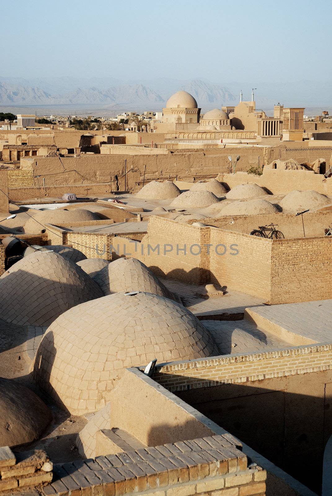rooftops of yazd iran by jackmalipan