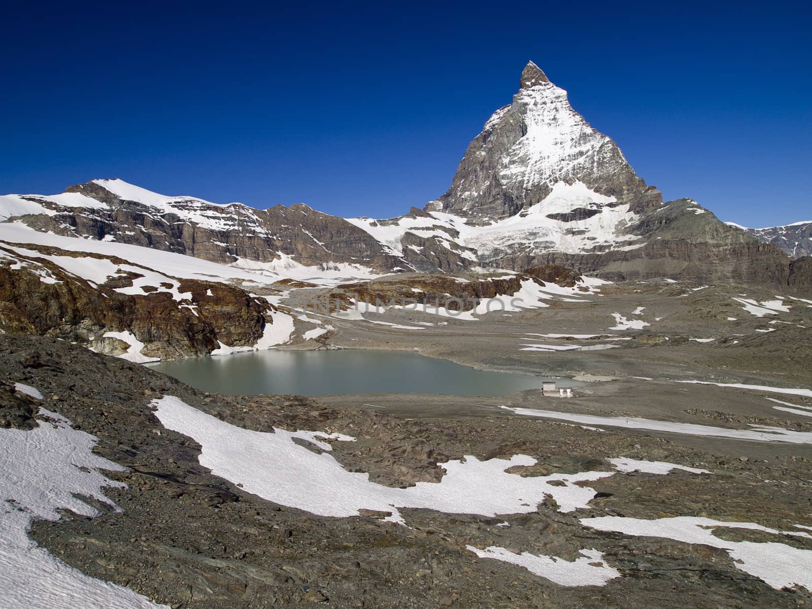 Matterhorn and a cute lake in sunny day
